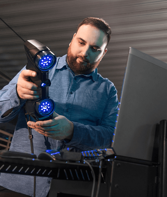 handyscan 3D black technician on shop floor